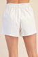 Playfully Put Tailored High Rise Shorts