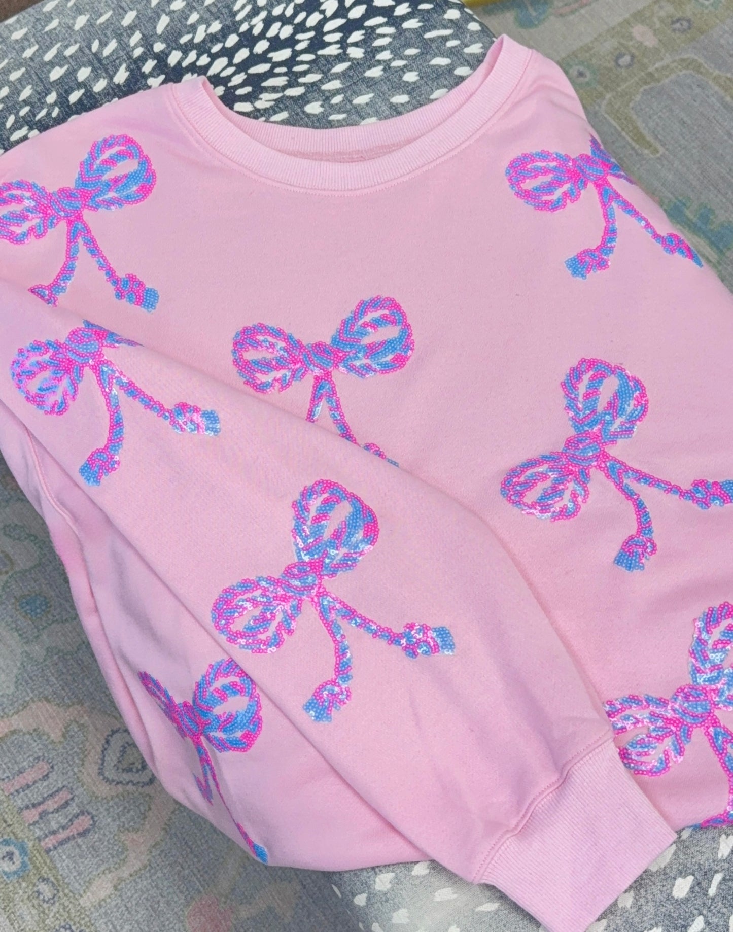 Fit To Be Tied Sequin Bow Pullover Top